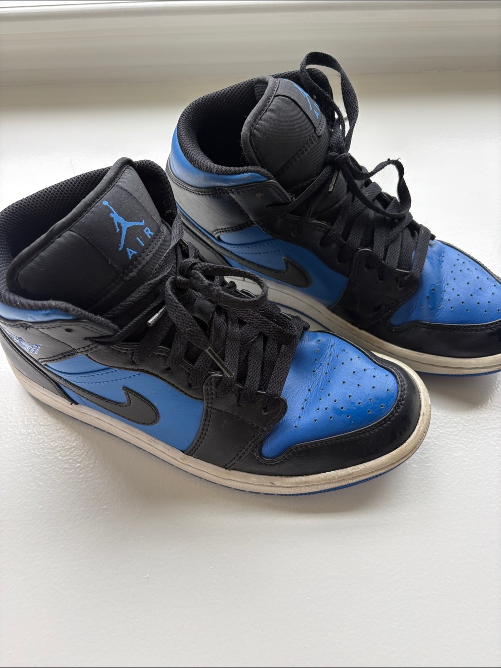 Jordan Black and Blue High-Top Sneakers